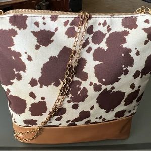 Adorable cow print crossbody!